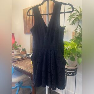 Adorable mini black lace dress with pockets, free people, size XS